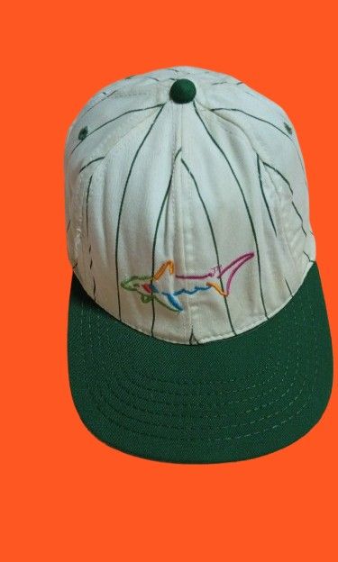 Greg Norman Golf Cap (Category: Caps & Hats) located in Quezon City. Submitted by jojoleen28 (Listing ID 1462340363, Image 1). Description: Original cap from one of the Golf greats. Stitched signature on back. Some loose stitches on the side as seen in the last photo; needs cleaning..