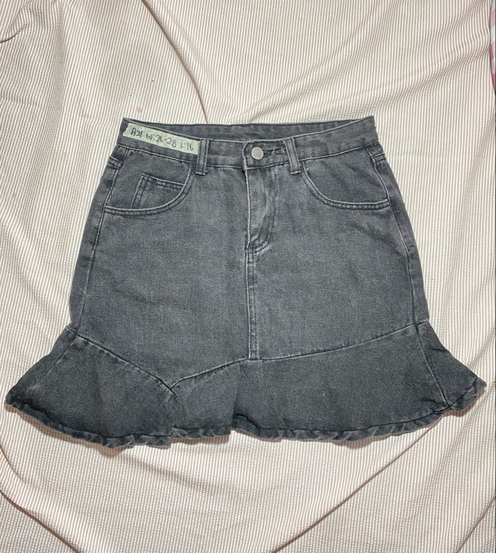 Grey Denim Ruffle Hem Mini Skirt (Category: Skirts) located in Paranaque City. Submitted by golden_jinkay (Listing ID 1462422918, Image 1). Description: -Waist:26-28 -Lenght:16 - Cute grey denim mini skirt - Features a ruffled hem detail - Estimated size: 26-28 (check tag) - Ideal for casual wear - Versatile and easy to pair with various tops.