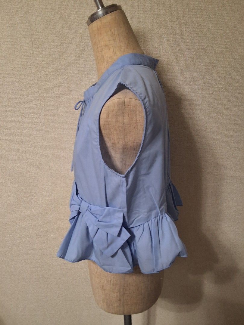GRL Ribbon frill sleeveless blouse (Category: Blouses) located in Santa Rosa. Submitted by bellesdreamph (Listing ID 1462433899, Image 3). Description: GRL Ribbon frill sleeveless blouse This refreshing sleeveless blouse is perfect for spring and summer outfits thanks to its light and comfortable feel. The round neckline and subtle neckline create a cool and relaxed impression. The flared hem and three eye-catching ribbons add a feminine touch. T