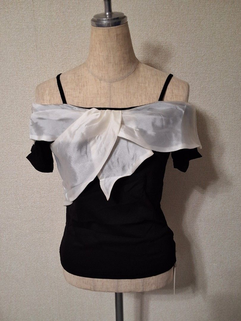 GRL Sheer Ribbon Off-Shoulder Top (Category: Blouses) located in Santa Rosa. Submitted by bellesdreamph (Listing ID 1462433705, Image 2). Description: GRL Sheer Ribbon Off-Shoulder Top This eye-catching top features an asymmetrical sheer ribbon design. The off-shoulder style boldly reveals the décolletage, allowing for a sophisticated display of skin. The bodice is made from a stretchy knit fabric for comfortable wear. The compact length makes it