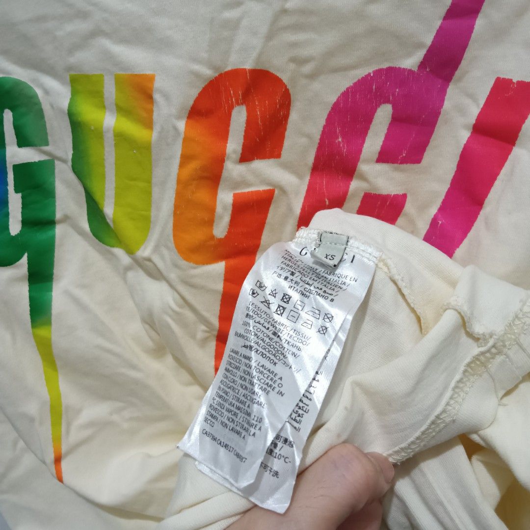 GUCCI Multi Color Logo Shirt (Category: Shirts) located in Caloocan City. Submitted by jaychingsss (Listing ID 1462364433, Image 3). Description: Gucci Multi Color Logo Shirt - 100 20x26 Complete Tags Color Rate: 9/10 (Cream Color) Minor issue: Few hairlines sa print. check pic NEED WASH.