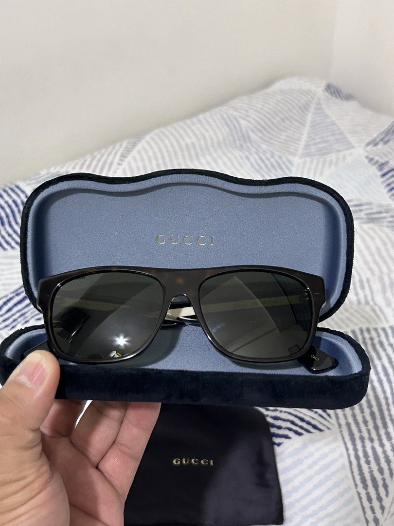 Gucci Sunglasses for Men (Category: Sunglasses & Eyewear) located in Mandaluyong City. Submitted by nicko.montalbo (Listing ID 1462366299, Image 1). Description: - Authentic Gucci sunglasses - Very Good Condition - Classic tortoiseshell frame - Comes with original case and dust bag - Model number: GG0341S 003 - Size 56-17-150 Price: Php 14,000 negotiable Meet ups: Mrt Boni, Mandaluyong PM/Call : 09175999092.