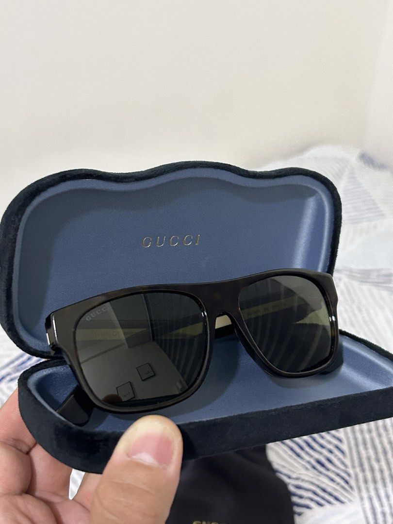 Gucci Sunglasses for Men (Category: Sunglasses & Eyewear) located in Mandaluyong City. Submitted by nicko.montalbo (Listing ID 1462366299, Image 2). Description: - Authentic Gucci sunglasses - Very Good Condition - Classic tortoiseshell frame - Comes with original case and dust bag - Model number: GG0341S 003 - Size 56-17-150 Price: Php 14,000 negotiable Meet ups: Mrt Boni, Mandaluyong PM/Call : 09175999092.
