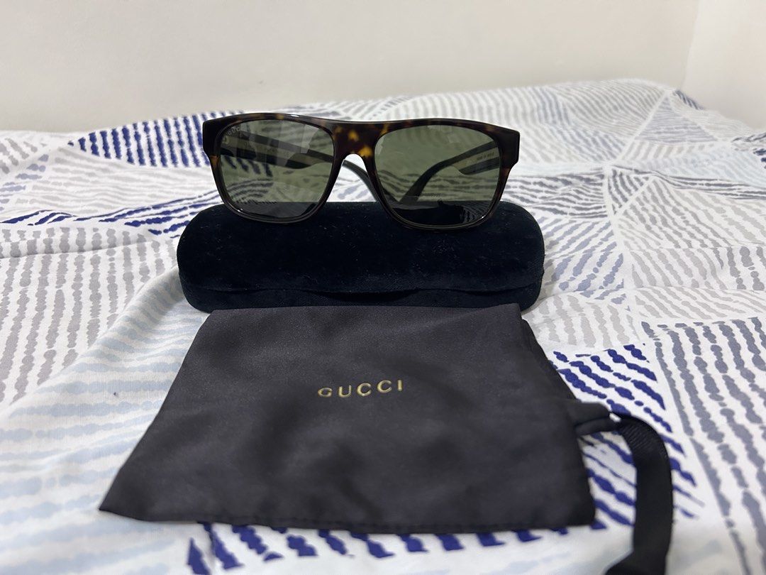 Gucci Sunglasses for Men (Category: Sunglasses & Eyewear) located in Mandaluyong City. Submitted by nicko.montalbo (Listing ID 1462366299, Image 3). Description: - Authentic Gucci sunglasses - Very Good Condition - Classic tortoiseshell frame - Comes with original case and dust bag - Model number: GG0341S 003 - Size 56-17-150 Price: Php 14,000 negotiable Meet ups: Mrt Boni, Mandaluyong PM/Call : 09175999092.