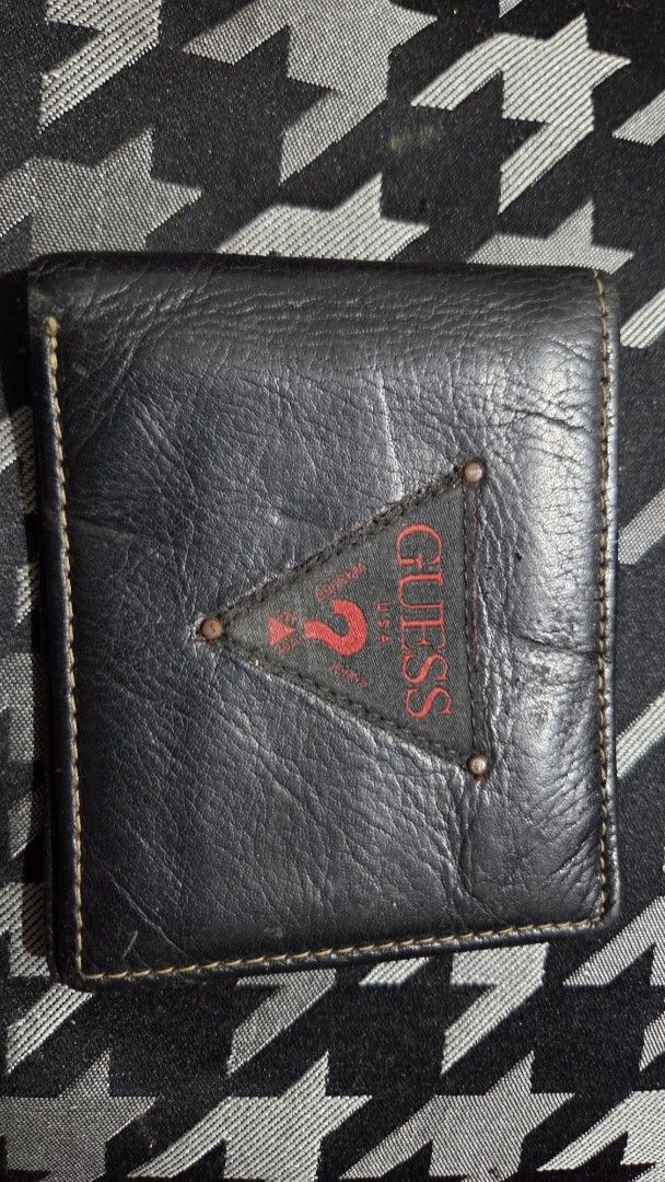 Guess Black Leather Bifold Wallet (Category: Wallets & Card Holders) located in Quezon City. Submitted by kctheexplorer05 (Listing ID 1462332052, Image 1). Description: - Guess black genuine leather bifold wallet - Multiple card slots and bill compartment - Red interior lining - Plenty of life left, perfect for everyday carry -WYIWYG .