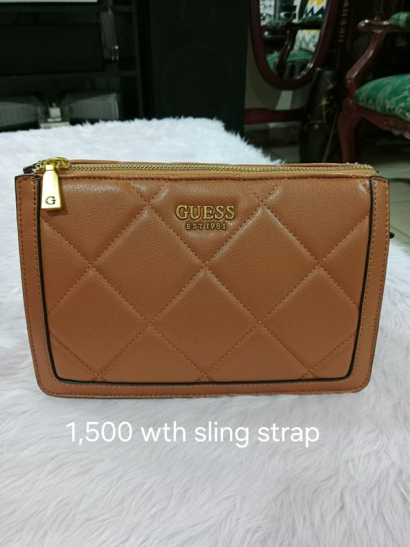 Guess Quilted Brown Handbag with Sling Strap (Category: Luxury Bags & Wallets) located in Pasig City. Submitted by janalopez904 (Listing ID 1462301520, Image 1). Description: - Brand: Guess - Color: Brown - Design: Quilted - Hardware: Gold (zipper) - Features: Includes sling strap - Ideal for: Everyday use - Price: PHP 1,500.