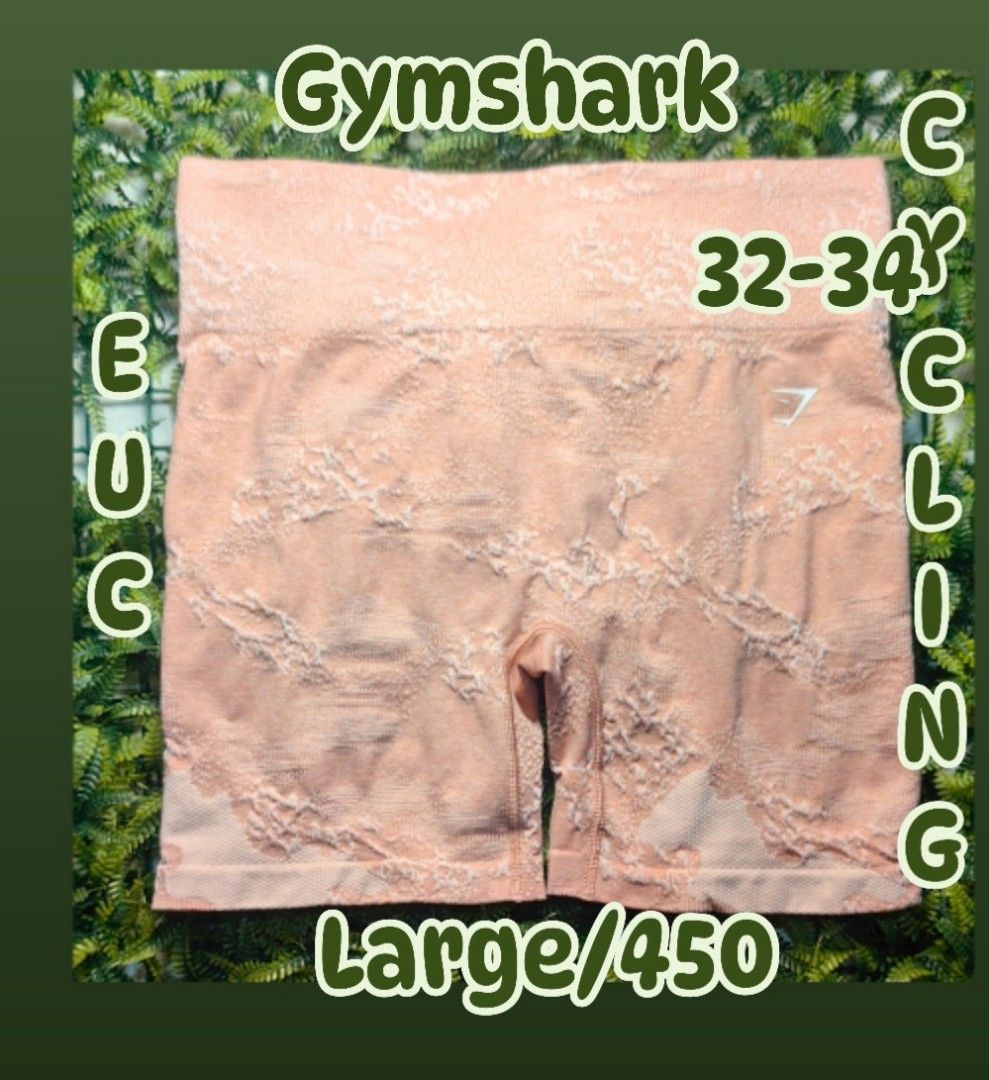Gymshark Cycling Shorts - Peach Pattern - Large (Category: Activewear) located in Valenzuela. Submitted by jordanarod0414 (Listing ID 1462409963, Image 1). Description: - Gymshark Cycling Shorts - Color: Peach with white pattern - Size: Large (fits waist 32-34 inches) - Perfect for workouts or casual wear - Selling as a bundle.