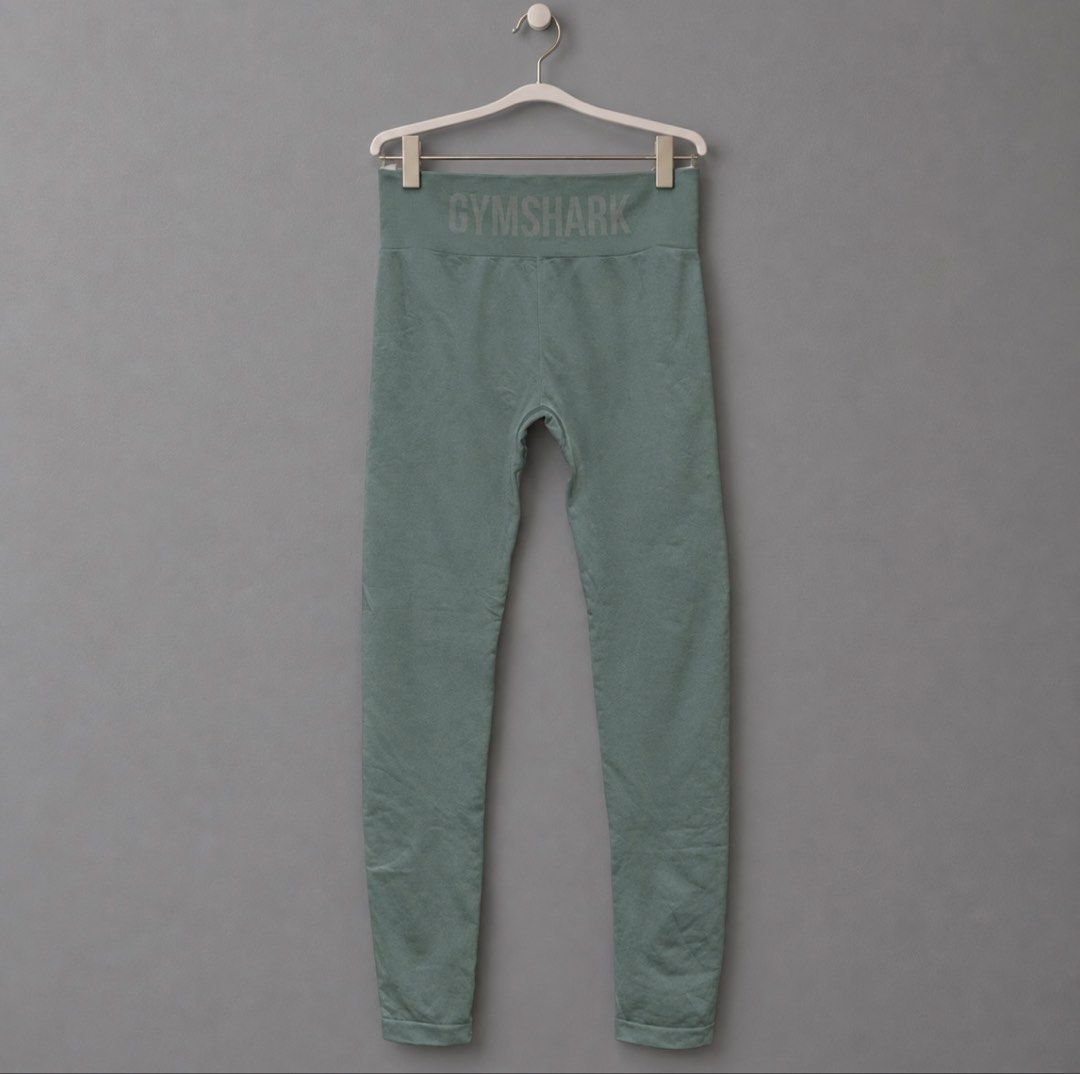 Gymshark Leggings Size M (Category: Activewear) located in Manila. Submitted by zennyaur (Listing ID 1462417791, Image 1). Description: - Brand: Gymshark - Color: Green - Style: Seamless Leggings - Fit: High-waisted - Size: Medium (M) - Material: Comfortable and stretchy - Origin: Made in Bangladesh - Versatile: Suitable for workouts or casual wear.