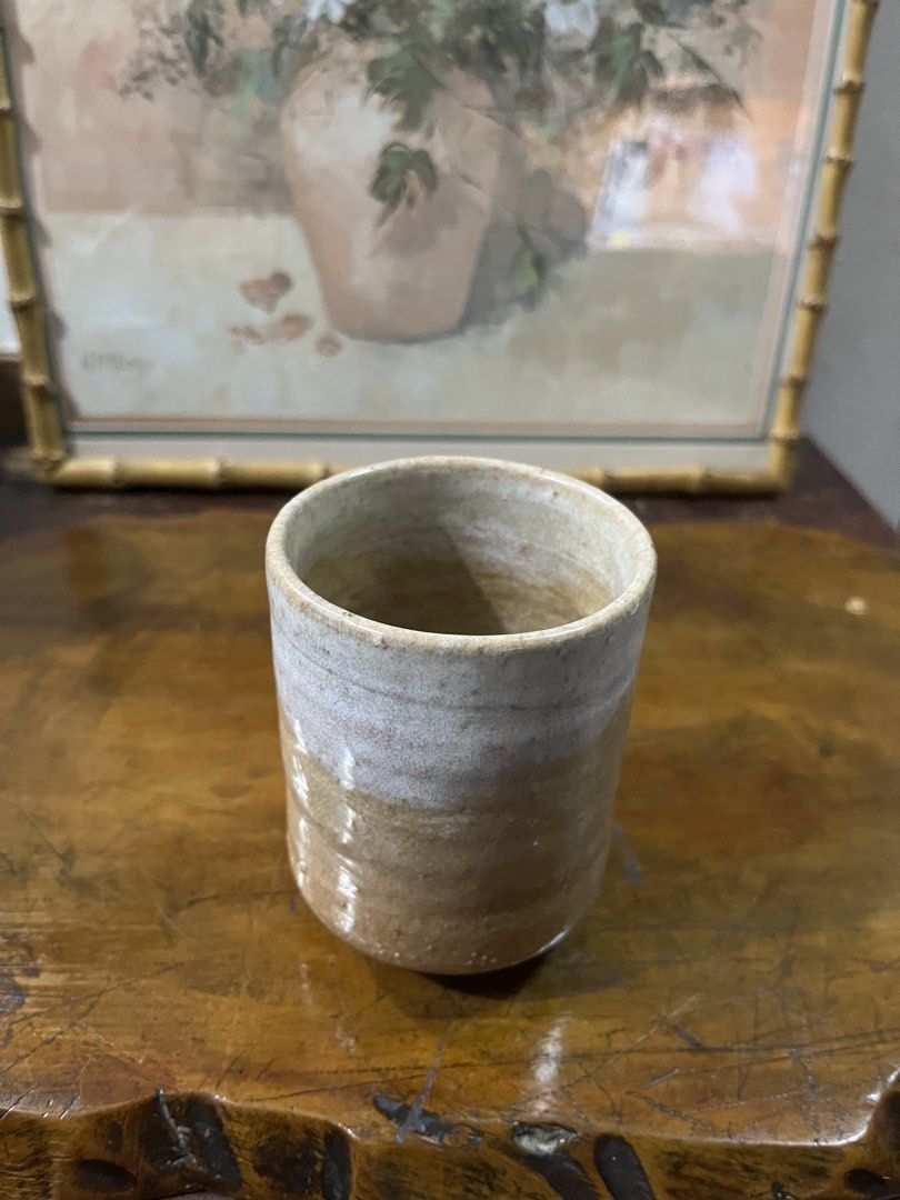 Handmade Ceramic Tea Cup (Category: Coffee & Tea Tableware) located in Taguig. Submitted by minmin_parker (Listing ID 1462361758, Image 2). Description: - Rustic ceramic cup with a natural, earthy glaze. - Features a white wash on the top half for a unique look. - Perfect for enjoying your favorite tea or coffee. - Handcrafted feel adds character to your kitchen or desk. - Creates a cozy and inviting atmosphere..