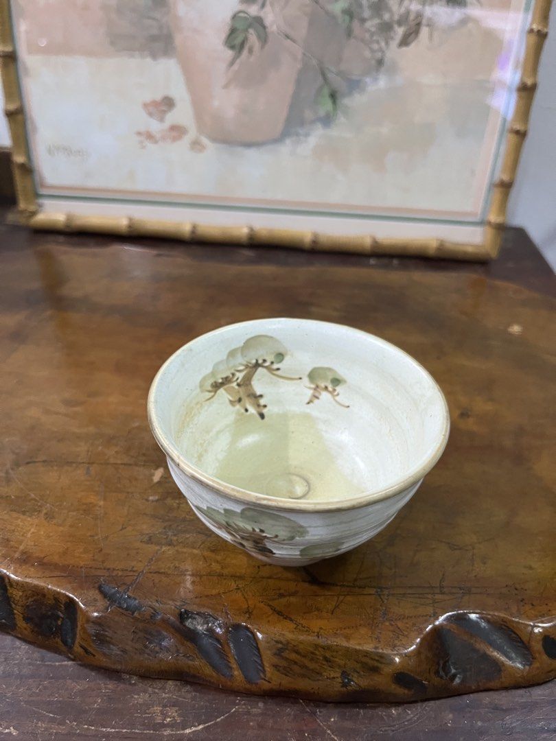 Hand-painted Ceramic Bowl with Tree Design (Category: Vases & Decorative Bowls) located in Taguig. Submitted by minmin_parker (Listing ID 1462371797, Image 2). Description: - Unique hand-painted ceramic bowl - Features a rustic tree design with textured glaze - Unglazed base - Ideal for serving small snacks or as a decorative accent - Artisanal, one-of-a-kind look - Approximately 4 inches in diameter.
