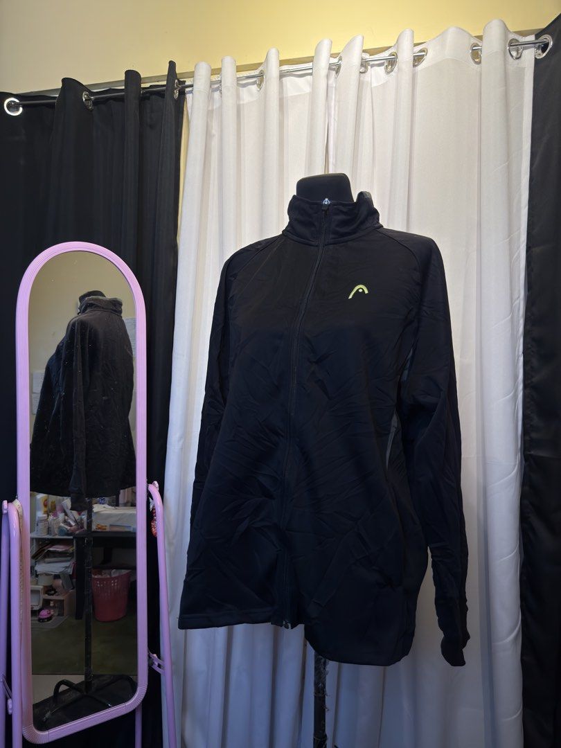 HEAD Black Track Jacket (Category: Coats, Jackets and Outerwear) located in Pulilan. Submitted by _sevegn (Listing ID 1462304546, Image 1). Description: - Brand: HEAD - Color: Black - Style: Track Jacket - Closure: Full zip - Features: HEAD logo on chest - Material: Lightweight - Ideal for: Sports or casual wear.