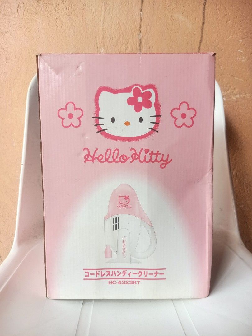 Hello Kitty Cordless Handheld Vacuum Cleaner HC-4323KT (Category: Vacuum Cleaner & Housekeeping) located in Gerona. Submitted by balag. (Listing ID 1462276984, Image 2). Description: - Adorable pink and white Kitty handheld vacuum - Perfect for quick cleanups - Cordless design for ultimate convenience - Comes with original box and charging adapter - Great for small spaces and car interiors.