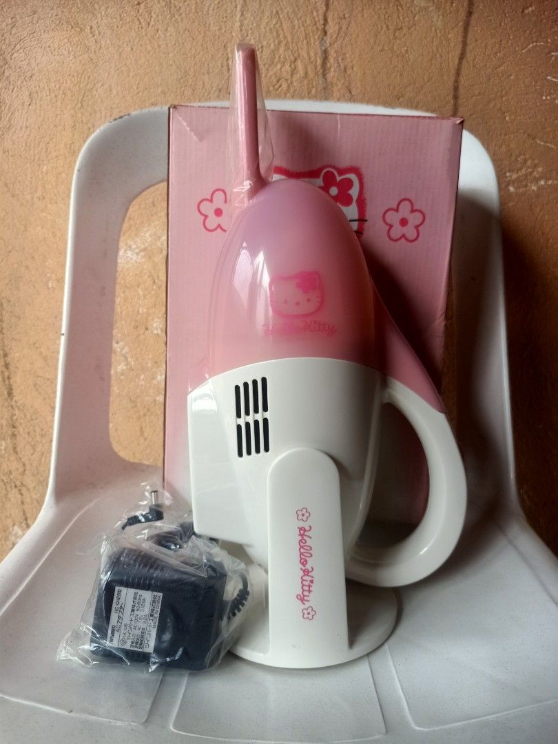 Hello Kitty Cordless Handheld Vacuum Cleaner HC-4323KT (Category: Vacuum Cleaner & Housekeeping) located in Gerona. Submitted by balag. (Listing ID 1462276984, Image 1). Description: - Adorable pink and white Kitty handheld vacuum - Perfect for quick cleanups - Cordless design for ultimate convenience - Comes with original box and charging adapter - Great for small spaces and car interiors.