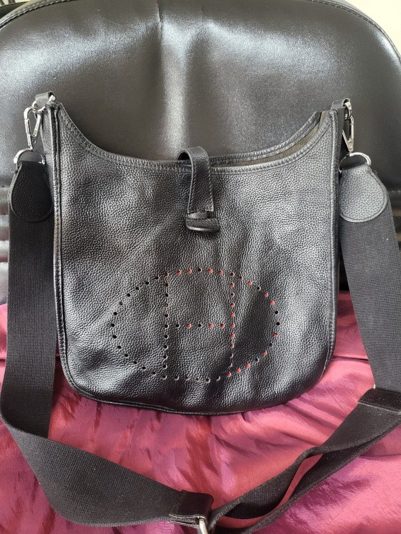 Hermes Black Leather Shoulder Bag (Category: Luxury Bags & Wallets) located in Manila. Submitted by milkymitch23 (Listing ID 1462437022, Image 1). Description: - Hermes black leather shoulder bag - Iconic Hermes 'H' cut-out detail - Adjustable strap for comfortable wear - Interior features a small pocket - Made in France - NGA - PM if interested - may bawas if sure buyer.