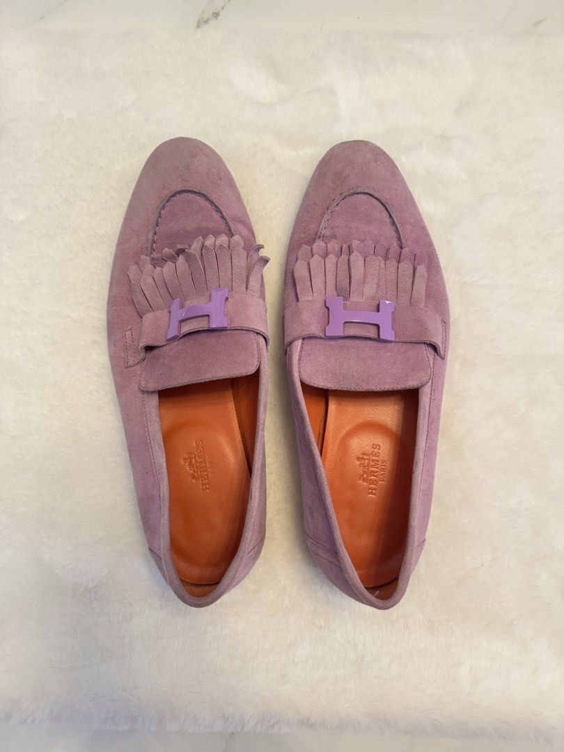 Hermes Moccasin Royal Loafers (Category: Loafers) located in San Nicolas. Submitted by ihascat (Listing ID 1462302148, Image 1). Description: - Hermes lavender suede loafers - Iconic purple H buckle - Orange leather interior with Hermes Paris branding - Comfortable slip-on style - Versatile for dressing up or down.