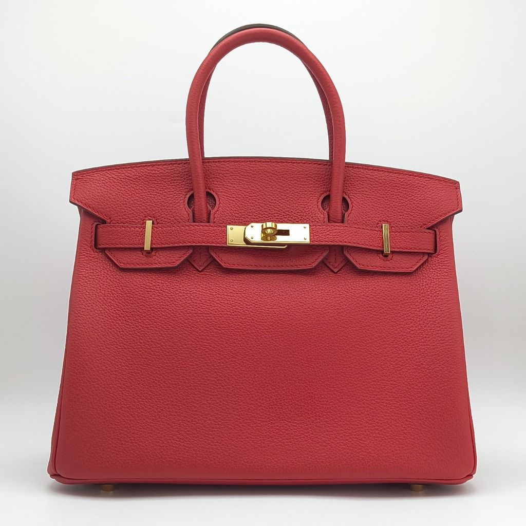 Hermes Birkin 30 Rouge Casaque Red Bag (Category: Luxury Bags & Wallets) located in Cebu City. Submitted by theluxxaffair (Listing ID 1462434481, Image 1). Description: Hermes Birkin 30 bag in red Togo leather with gold-tone hardware. Features dual top handles, signature turn-lock closure and protective feet. Spacious interior with slip and zip pockets. Includes padlock, keys and leather clochette. Length: 30 cm Height: 22 cm Depth: 15 cm Colour: