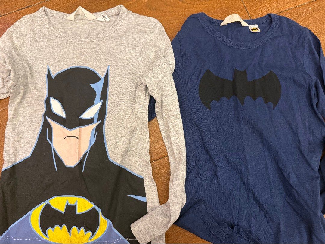 H&M Batman Long Sleeve Shirts (2-Pack) (Category: Babies & Kids Fashion) located in Bulacan. Submitted by emjay_17 (Listing ID 1462286288, Image 2). Description: - Two H&M long sleeve shirts for kids - One grey shirt with a Batman graphic - One navy blue shirt with a Batman logo - Made from comfortable cotton material - Perfect for any young Batman fan!.