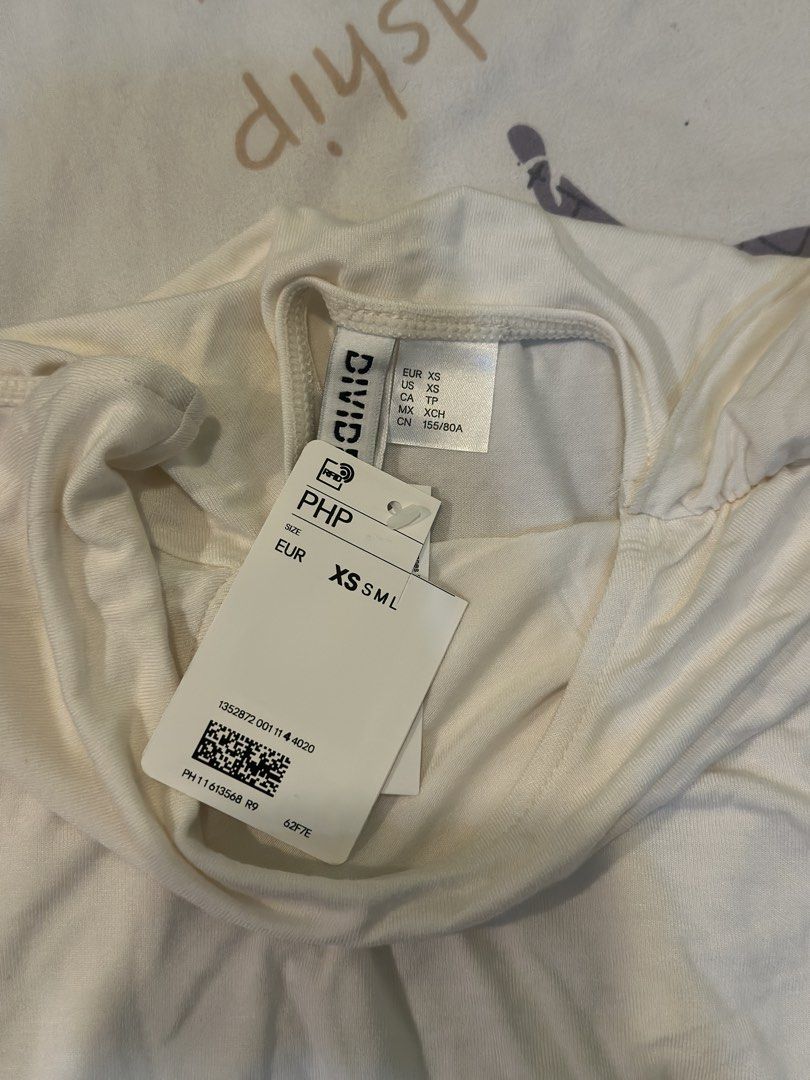 H&M Draped-Panel Viscose Top (Category: Sleeveless) located in Quezon City. Submitted by brokeahhgirl (Listing ID 1462350001, Image 3). Description: No issue Never worn.