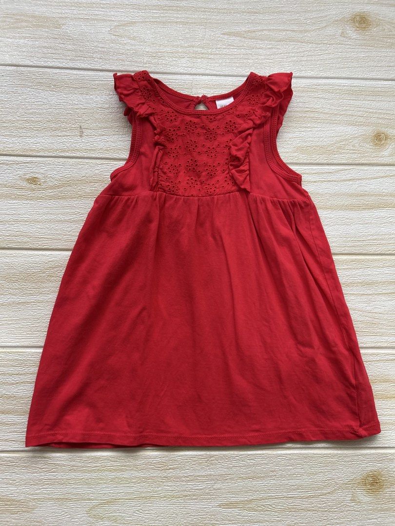 H&M red sleeveless dress (Category: Babies & Kids Fashion) located in Cebu City. Submitted by yjainani (Listing ID 1462343179, Image 1). Description: featuring a delicate eyelet embroidered chest panel and ruffled shoulders.