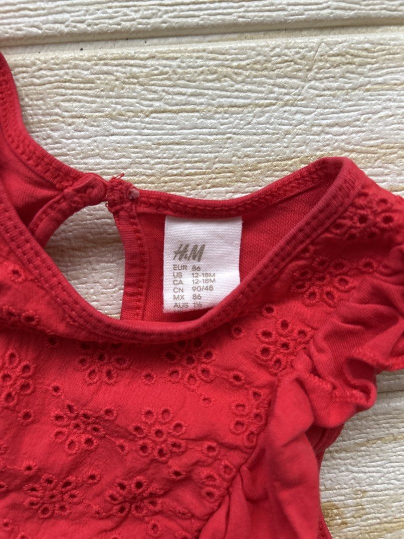 H&M red sleeveless dress (Category: Babies & Kids Fashion) located in Cebu City. Submitted by yjainani (Listing ID 1462343179, Image 3). Description: featuring a delicate eyelet embroidered chest panel and ruffled shoulders.