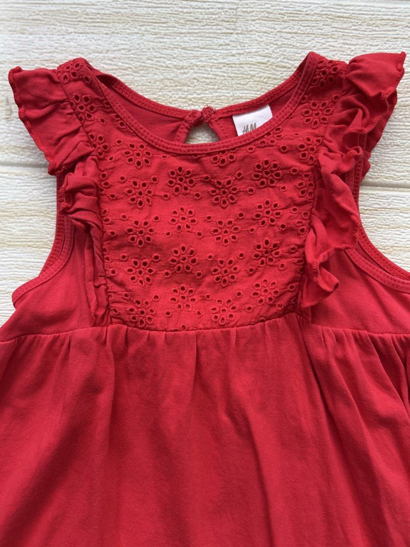 H&M red sleeveless dress (Category: Babies & Kids Fashion) located in Cebu City. Submitted by yjainani (Listing ID 1462343179, Image 2). Description: featuring a delicate eyelet embroidered chest panel and ruffled shoulders.