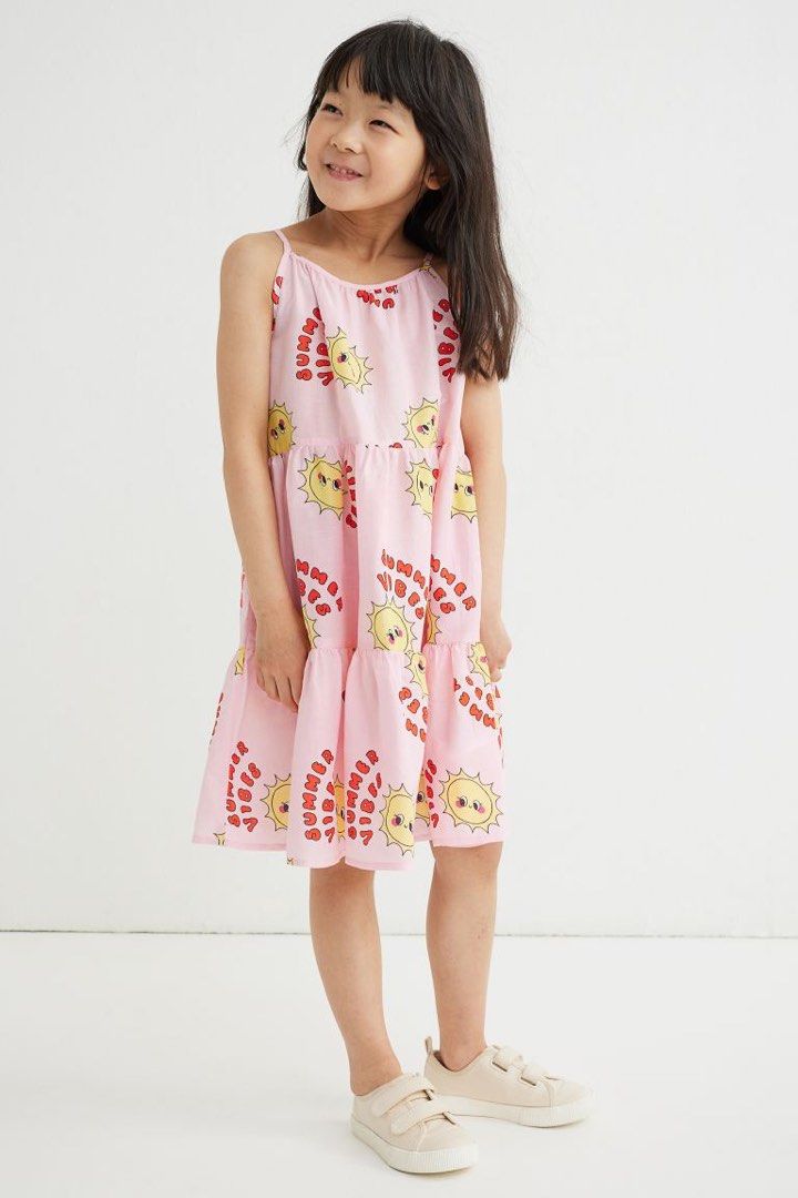 H&M SUMMER VIBES dress (Category: Babies & Kids Fashion) located in Cebu City. Submitted by yjainani (Listing ID 1462349668, Image 3). Description: pink tiered kids' dress featuring a playful sun and "SUMMER VIBES" text print..