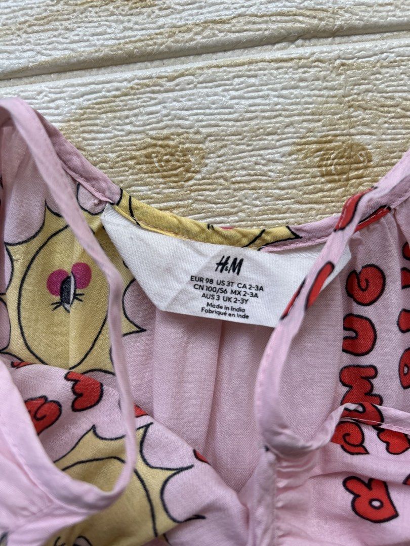 H&M SUMMER VIBES dress (Category: Babies & Kids Fashion) located in Cebu City. Submitted by yjainani (Listing ID 1462349668, Image 2). Description: pink tiered kids' dress featuring a playful sun and "SUMMER VIBES" text print..