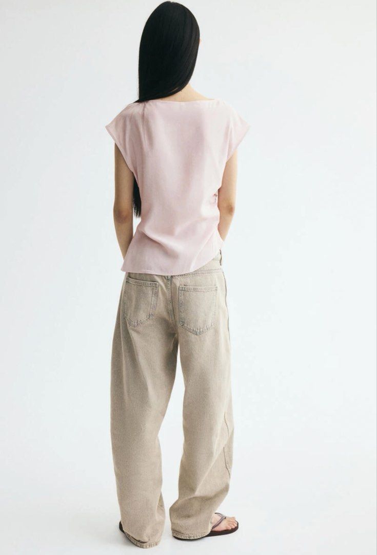 H&M Top (Category: Sleeveless) located in Cabanatuan. Submitted by scrlttt (Listing ID 1462338474, Image 3). Description: - Light pink top from Divided - Boat neck with short sleeves - Ruching on one side for a flattering fit - Soft and comfortable fabric - Versatile for casual or dressed-up looks -RFS wring size will buy a smaller one.