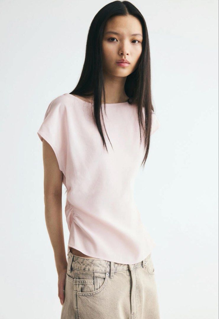 H&M Top (Category: Sleeveless) located in Cabanatuan. Submitted by scrlttt (Listing ID 1462338474, Image 2). Description: - Light pink top from Divided - Boat neck with short sleeves - Ruching on one side for a flattering fit - Soft and comfortable fabric - Versatile for casual or dressed-up looks -RFS wring size will buy a smaller one.
