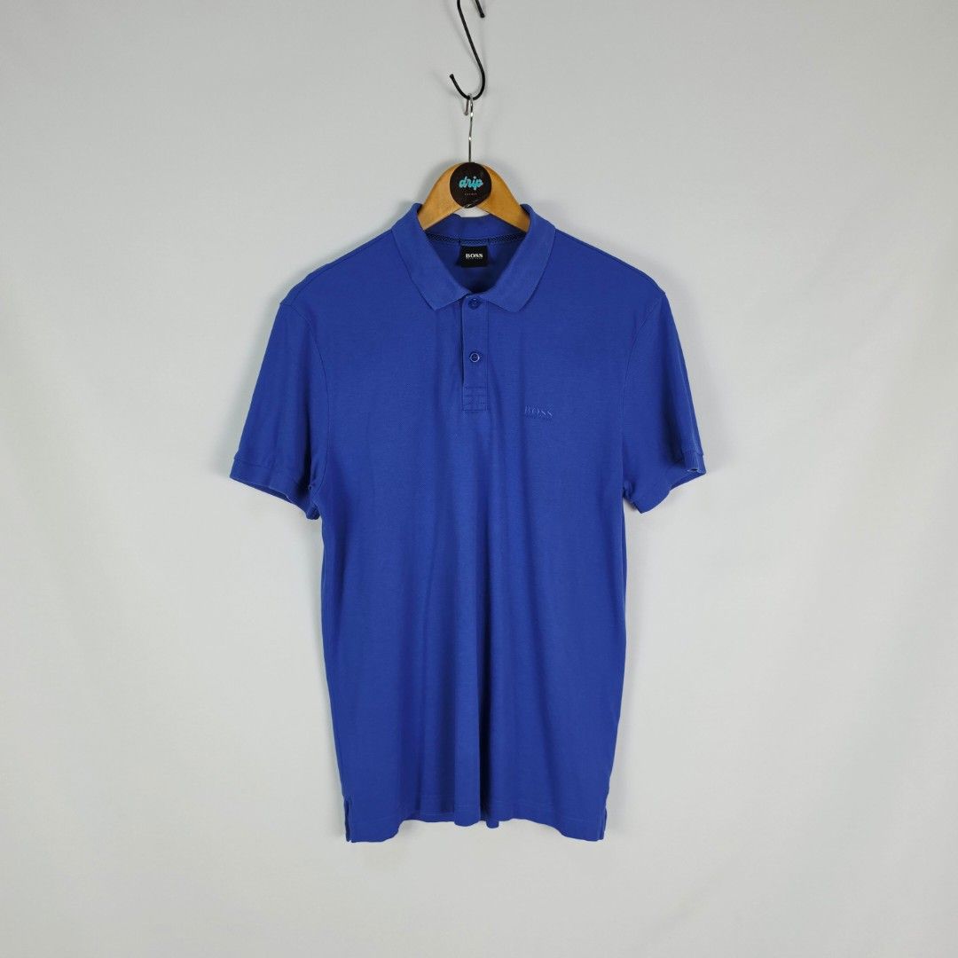 Hugo Boss Blue Rubberized Small Side Script Mesh Poloshirt with Verifiable QR Code (Category: Tshirts & Polo Shirts ) located in Pasig City. Submitted by driplocale (Listing ID 1462388551, Image 1). Description: Hugo Boss Blue Rubberized Small Side Script Mesh Poloshirt with Verifiable QR Code Condition 9.5/10 (Pristine Condition✨) Size: Medium Chest Width: 21inches Shoulder Width: 17.5inches Length (Shoulder to Hem): 29inches.