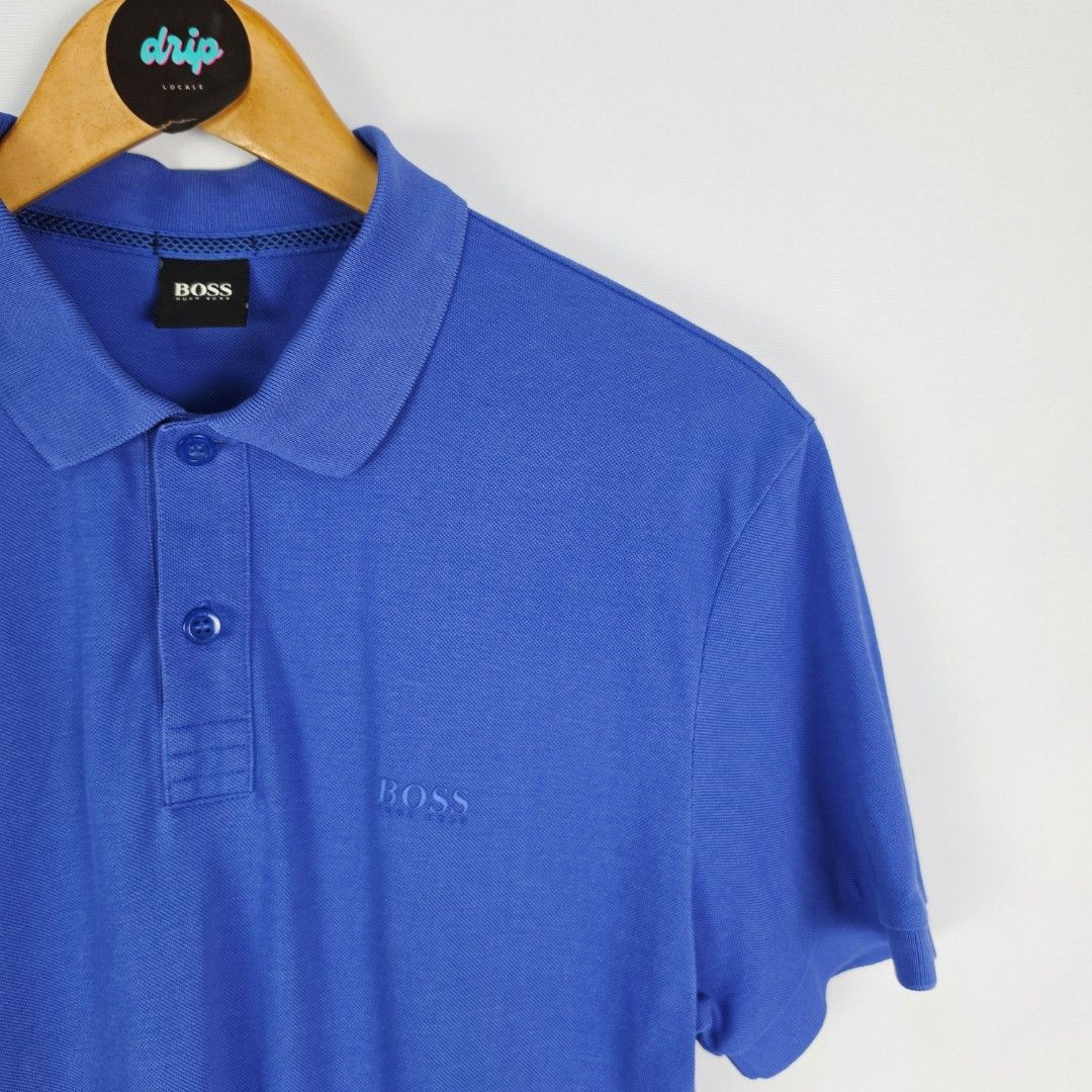 Hugo Boss Blue Rubberized Small Side Script Mesh Poloshirt with Verifiable QR Code (Category: Tshirts & Polo Shirts ) located in Pasig City. Submitted by driplocale (Listing ID 1462388551, Image 3). Description: Hugo Boss Blue Rubberized Small Side Script Mesh Poloshirt with Verifiable QR Code Condition 9.5/10 (Pristine Condition✨) Size: Medium Chest Width: 21inches Shoulder Width: 17.5inches Length (Shoulder to Hem): 29inches.