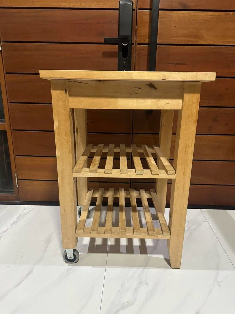 Ikea Bekvam Kitchen Cart Troller Side Table (Category: Tables & Sets) located in Quezon City. Submitted by dannikkishoppe2 (Listing ID 1462311618, Image 2). Description: Ikea Bekvam Kitchen Cart Troller Side Table ‼️₱4000‼️ *solid birch wood with convenient slatted storage shelves and rolling caster wheels *good as new Please manage your expectations as there might be minimal flaws. Color may vary due to lighting, it may appear darker or lighter 