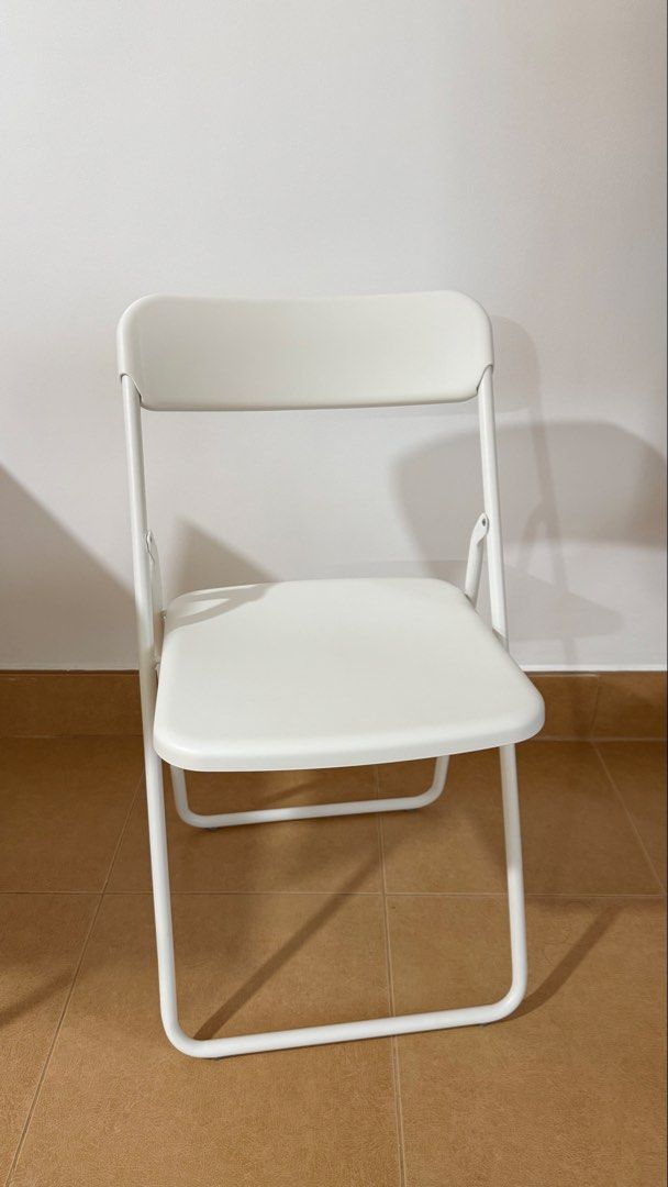 IKEA VIHALS White Folding Chair (Category: Chairs) located in Quezon City. Submitted by jocelletheseller (Listing ID 1462330261, Image 2). Description: - IKEA VIHALS folding chair - White color - Designed by Ola Wihlborg - Made in China - Supports up to 100 kg (220 lb) - Ideal for extra seating - Folds flat for easy storage.