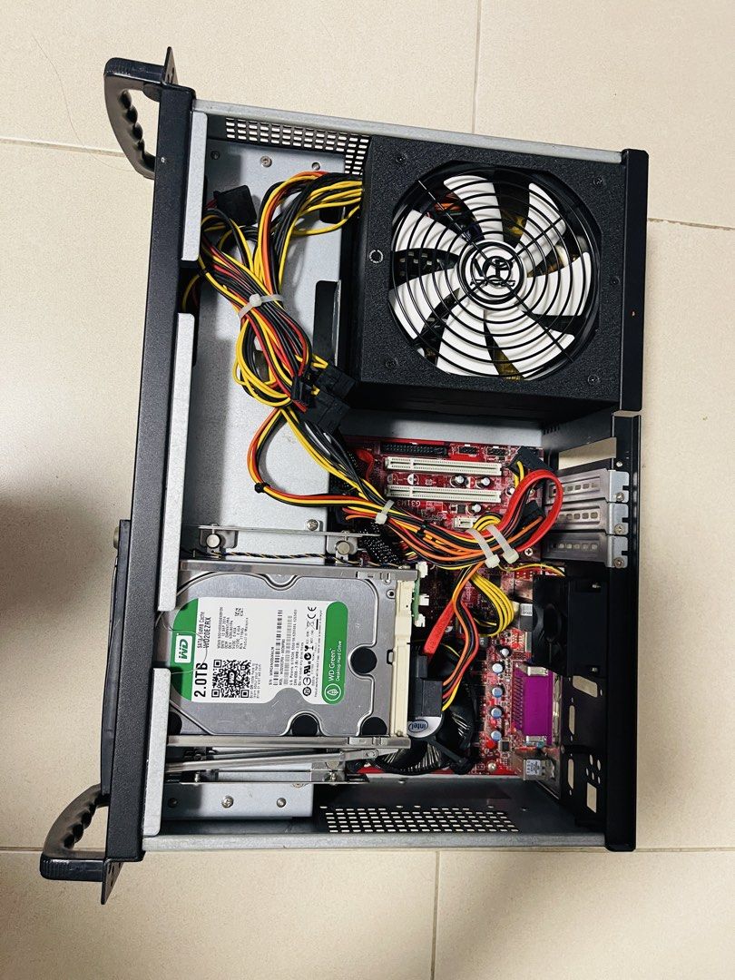 Intel Pentium E5300 Desktop PC (Category: Desktops) located in Singapore. Submitted by tiger15991115 (Listing ID 1462326310, Image 2). Description: - Desktop computer ready for use - Windows XP,MS office 2003 - Processor: Intel Pentium E5300 (2.60GHz dual-core) - Motherboard: MSI G31M3 (MS-7528) - Memory: 2GB DDR2 RAM - Storage: 2TB Western Digital Hard Drive - Includes 500W power supply and cooling fan.