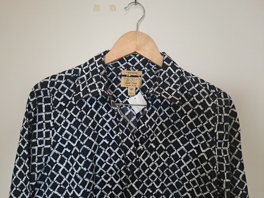 Investment longsleve (Category: Longsleeves) located in Manila. Submitted by joanbalde39643 (Listing ID 1462369387, Image 2). Description: The image shows an Investments Gold Label Petites "Christine" Non-Iron Button-Up Shirt. It features a distinctive black and white geometric grid pattern with a structured collar and a regular button-down front closure.