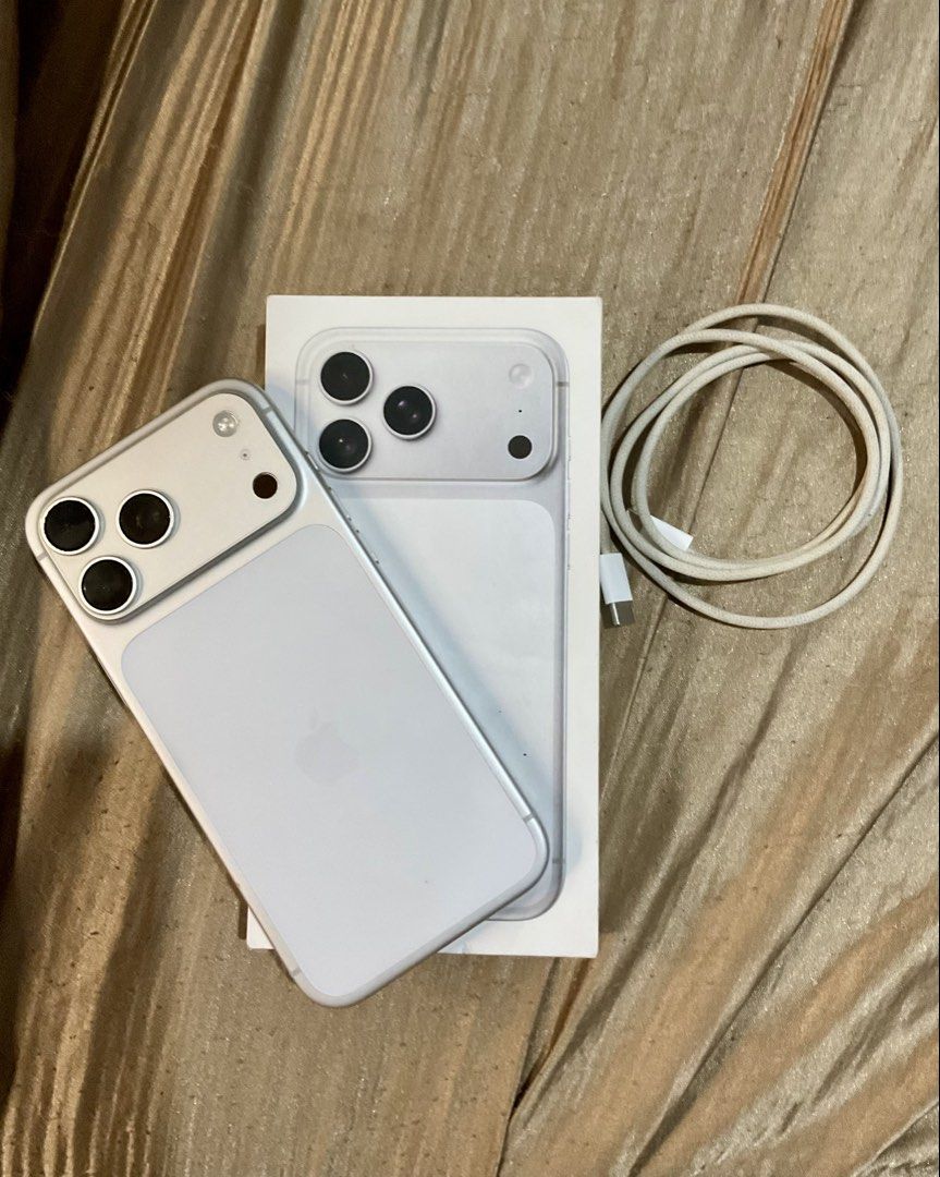 IPHONE 17 PRO MAX 1TB (Category: iPhone 17 Series) located in Manila. Submitted by ejjohnson (Listing ID 1462421396, Image 1). Description: * iPhone 17 Pro Max 1TB * Silver * 100% battery health * Cycle count 143 * FU * Around 4 months used * No issues/repairs * Original box + USB-C cable * Warranty until May 21, 2027 *92k.