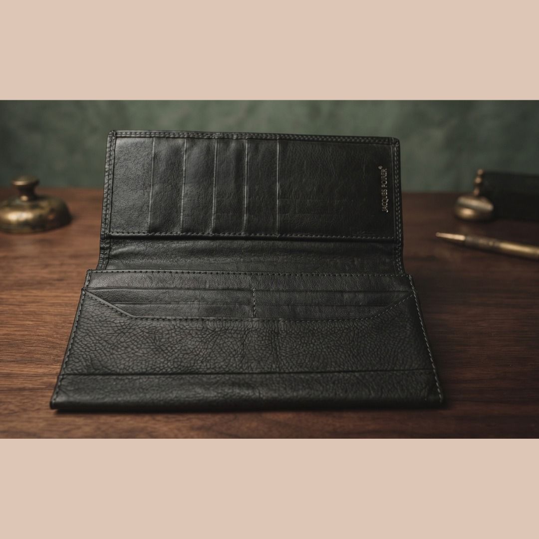Jacques Farel Black Leather Long Wallet (Category: Wallets & Card holders) located in Quezon City. Submitted by eilgaraje (Listing ID 1462433233, Image 3). Description: - Genuine black leather long wallet from Jacques Farel - Ample card slots and compartments for excellent organization - Features a pleasant leather texture - Interior is clean and well-maintained - Perfect for keeping your essentials tidy japan surplus 250.