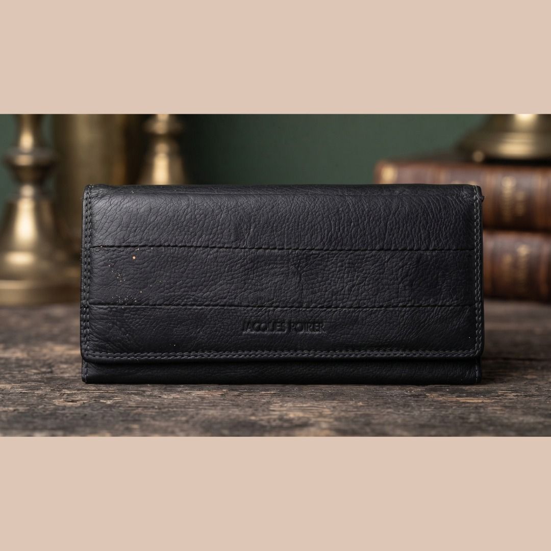Jacques Farel Black Leather Long Wallet (Category: Wallets & Card holders) located in Quezon City. Submitted by eilgaraje (Listing ID 1462433233, Image 1). Description: - Genuine black leather long wallet from Jacques Farel - Ample card slots and compartments for excellent organization - Features a pleasant leather texture - Interior is clean and well-maintained - Perfect for keeping your essentials tidy japan surplus 250.