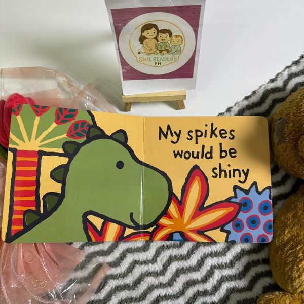 Jellycat If I were a dinosaur (Category: Children's Books) located in Taguig. Submitted by smlreadersph (Listing ID 1462360175, Image 3). Description: 💗 𝐈𝐟 𝐈 𝐖𝐞𝐫𝐞 𝐚 𝐃𝐢𝐧𝐨𝐬𝐚𝐮𝐫 🦖💚 Interactive Touch & Feel Small Board Book • Jellycat 📖 Condition: Preloved in very good to excellent used condition, with slight or barely noticeable shelf wear on the lower spine or edge of the cover. Still in lovely condition and ready for little hand