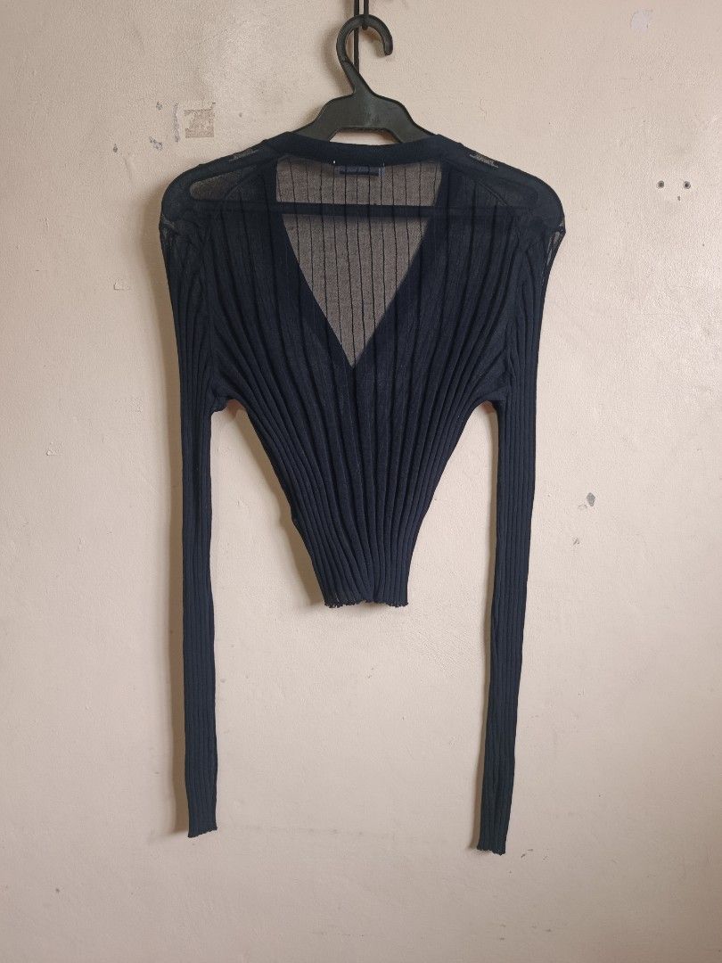 JIL SANDER (Category: Coats, Jackets and Outerwear) located in Dasmarinas. Submitted by jessicamae43174 (Listing ID 1462282812, Image 2). Description: - Navy blue Jil Sander cardigan - Sheer ribbed knit material - Long sleeves - V-neckline - Button-up front - Made in Italy - Size L - Ideal for layering.