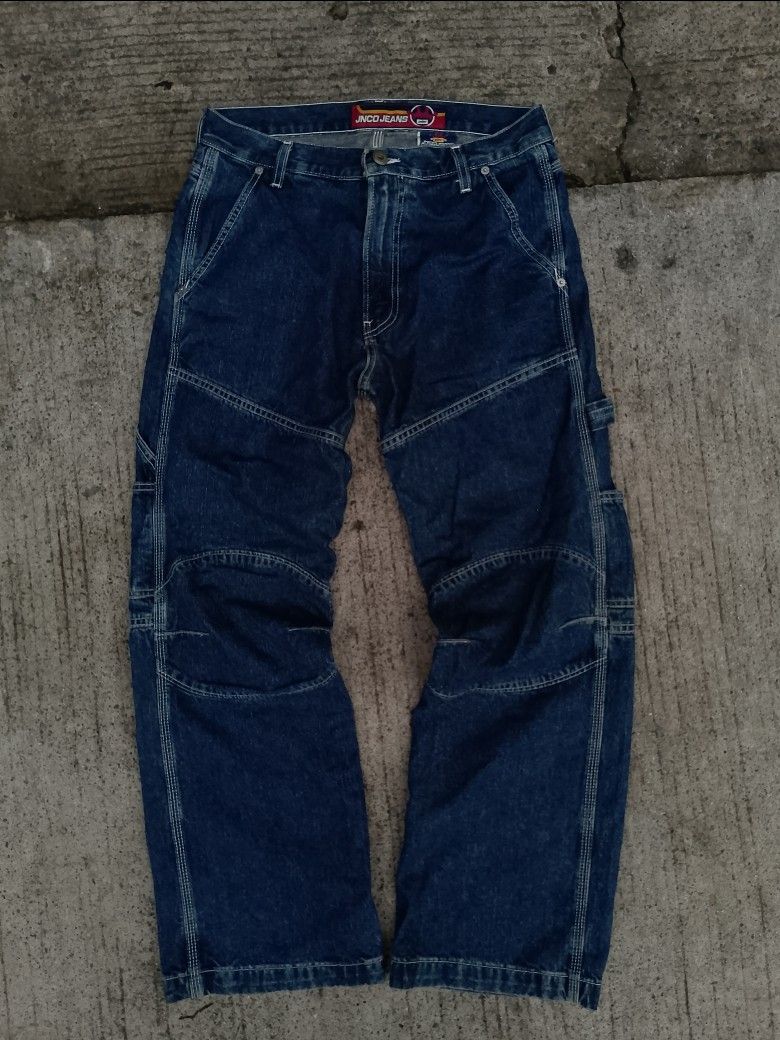 JNCO JEANS (Category: Jeans) located in Manila. Submitted by poisonthrift (Listing ID 1462364747, Image 1). Description: - Classic JNCO Jeans - Dark wash denim - Baggy fit with carpenter details - Double knee panels for durability - Multiple pockets for storage - Ideal for a relaxed streetwear style - Features the iconic red JNCO Jeans logo patch on the back pocket - JNCO Jeans since 1999.