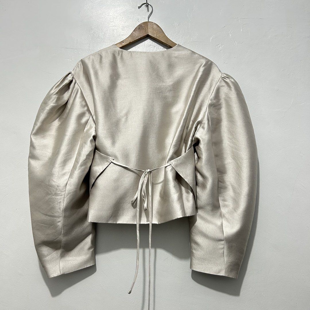 JNYLON STUDIOS Avant Garde Top (Medium) (Category: Coats, Jackets and Outerwear) located in Caloocan City. Submitted by lulufanatics (Listing ID 1462426833, Image 2). Description: This is a beautiful avant-garde statement piece from the independent designer label JNYLON STUDIOS. This specific item is a deconstructed satin puff-sleeve top (often styled or categorized as a cropped jacket or blouse) that showcases the brand's signature architectural