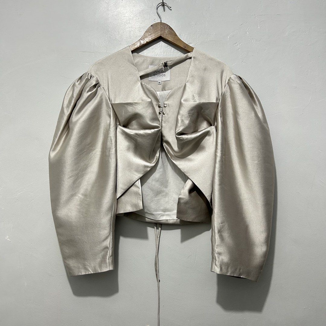 JNYLON STUDIOS Avant Garde Top (Medium) (Category: Coats, Jackets and Outerwear) located in Caloocan City. Submitted by lulufanatics (Listing ID 1462426833, Image 1). Description: This is a beautiful avant-garde statement piece from the independent designer label JNYLON STUDIOS. This specific item is a deconstructed satin puff-sleeve top (often styled or categorized as a cropped jacket or blouse) that showcases the brand's signature architectural