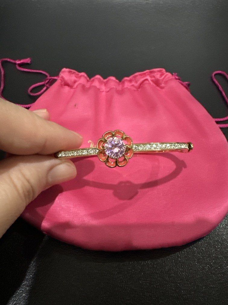 Juicy Couture Bangle (Category: Bracelets) located in Manila. Submitted by krystalchewey_ (Listing ID 1462403546, Image 1). Description: Bnew Actual Photo Posted 2500php Bangle .