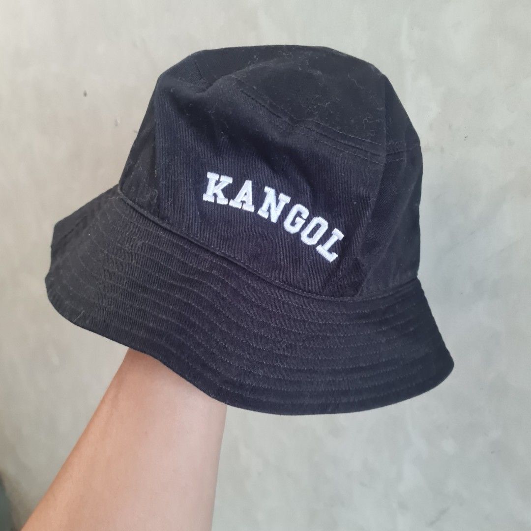 Kangol Black Bucket Hat - Medium (Category: Caps & Hats) located in Marikina City. Submitted by otitsmobagets (Listing ID 1462396802, Image 1). Description: - Classic black bucket hat from Kangol - Iconic embroidered Kangol logo on the front - Size: Medium - Made in China - Versatile for everyday wear and easy to style with any outfit.
