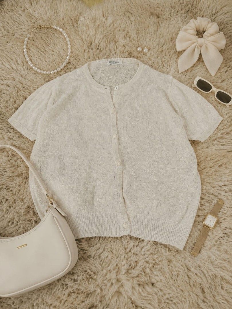 KASUGI Cream Knit Button-Up Cardigan (Category: Coats, Jackets and Outerwear) located in Manila. Submitted by t.flavelle (Listing ID 1462427939, Image 3). Description: FOR SALE KASUGI Cream Knit Button-Up Cardigan • Preloved / Used condition • Size Large to Semi-XL • Soft cream / off-white color • Lightweight knit fabric • Short sleeves • Round neckline • Button-down front • Classic and minimalist design • Easy to layer and style with jeans, trou