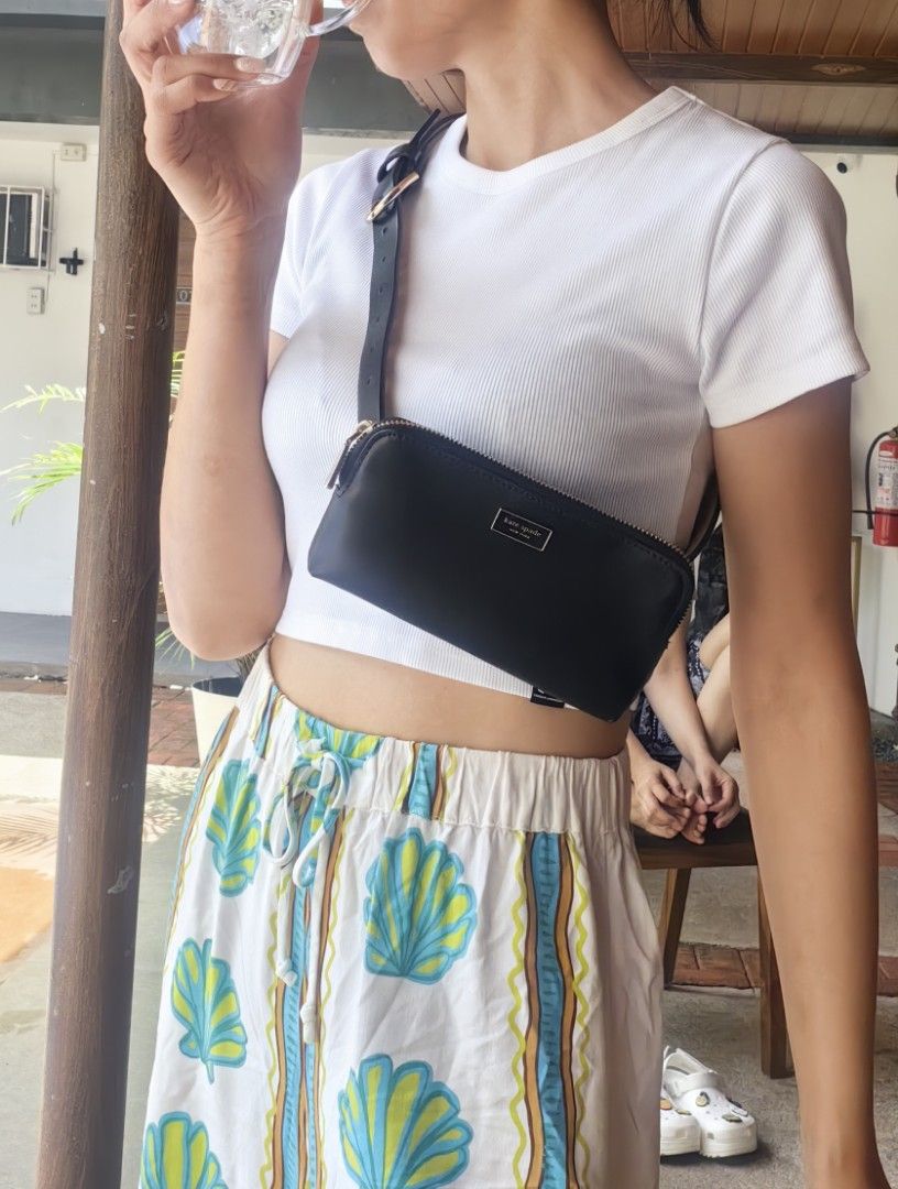 Kate Spade Black Leather Crossbody Bag (Category: Cross-body Bags) located in Quezon City. Submitted by flat.earther23 (Listing ID 1462433134, Image 1). Description: - Brand: Kate Spade - Material: Black Leather - Closure: Zipper - Strap: Adjustable, can be worn crossbody or on shoulder - Size: Small and compact, ideal for essentials - Style: Simple, classic, great for casual outings.