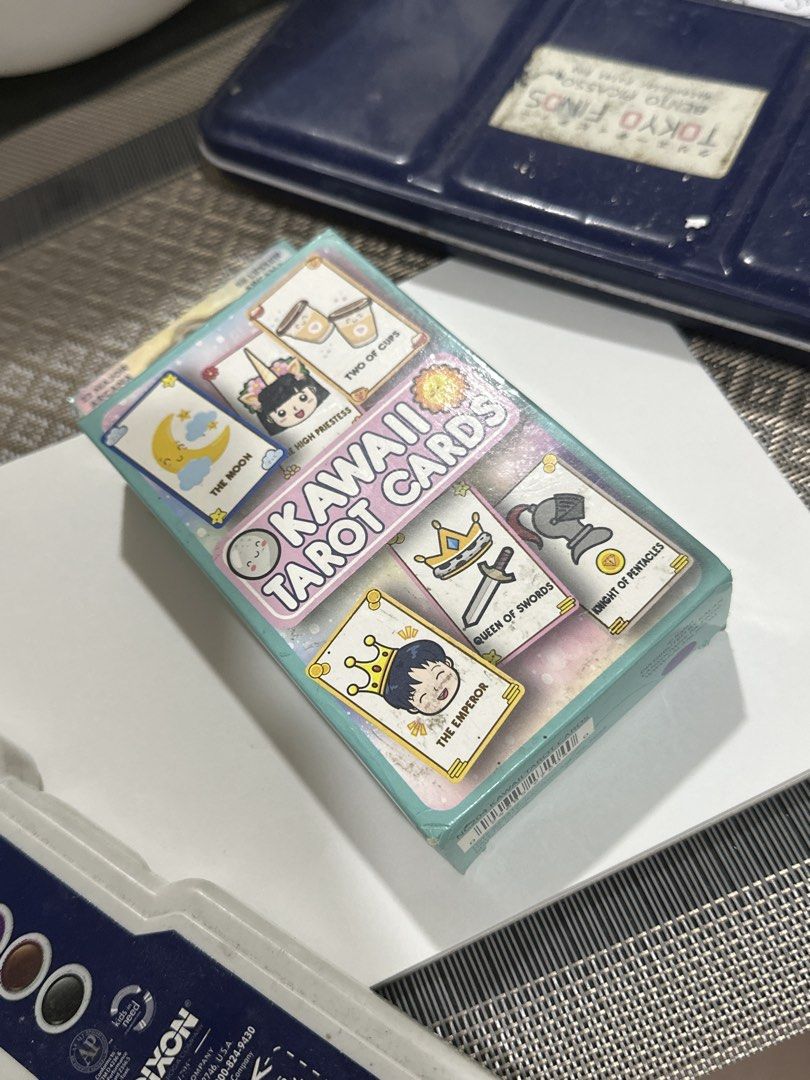 Kawaii Tarot Cards Deck - 78 Cards (Category: Vintage Collectibles) located in Pasig City. Submitted by bluejay23.water (Listing ID 1462330108, Image 1). Description: Adorable Kawaii Tarot Card Deck - Total of 78 cards (22 Major Arcana, 56 Minor Arcana) - Features fun and cute designs on every card - Ideal for beginners or those who love cute aesthetics - Box shows minor wear on the edges but cards are in great condition .