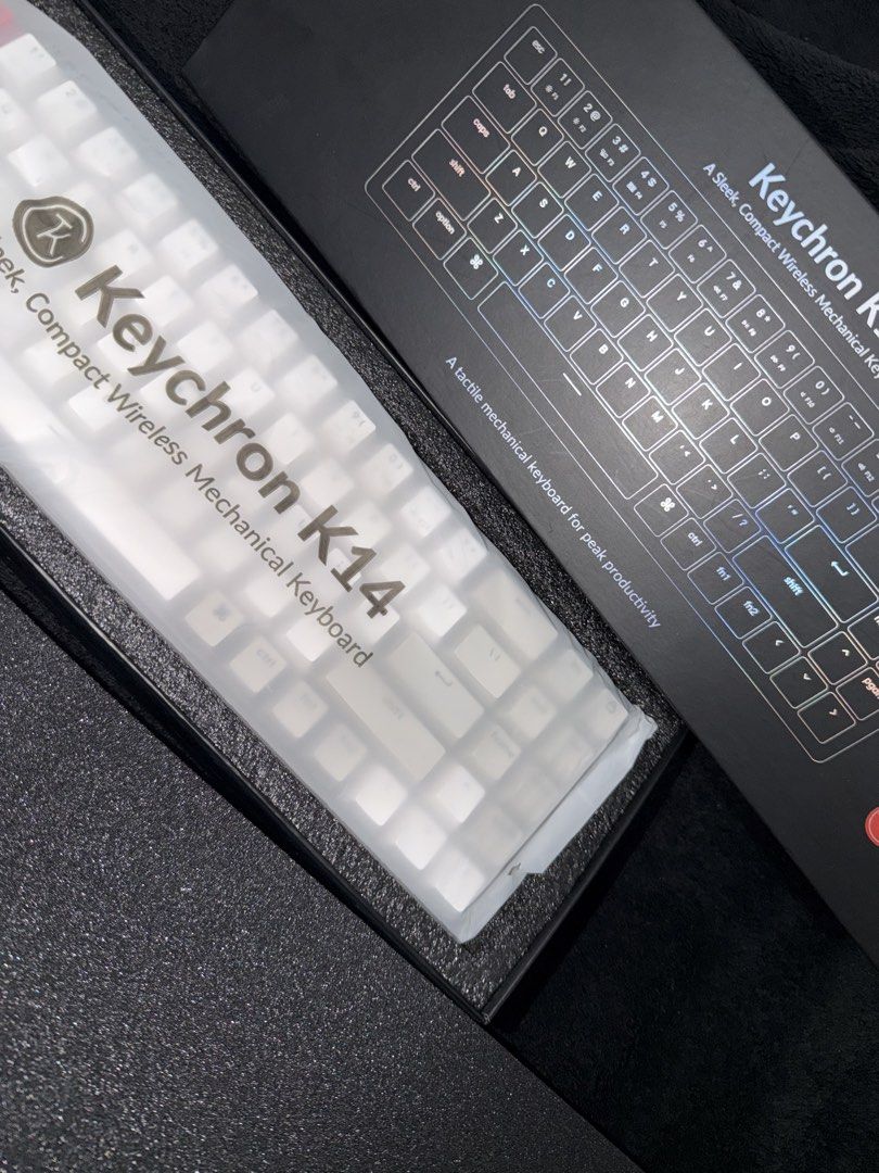 Keychron K14 Wireless Mechanical Keyboard (Category: Computer Keyboard) located in Pasig City. Submitted by amielvaldez (Listing ID 1462386544, Image 2). Description: - Sleek and compact design - Wireless mechanical keyboard - Tactile typing feel - Ideal for productivity - Includes original packaging.