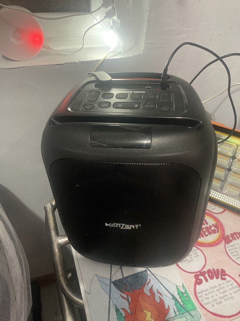 Konzert BULILIT UNO Party Speaker with Microphone (Category: Soundbars, Speakers & Amplifiers) located in Navotas City. Submitted by keenpenguin_13f502 (Listing ID 1462358489, Image 3). Description: - Konzert BULILIT UNO Party Speaker - 6.5" Speaker Size - 1 Wireless Microphone Included - Connectivity: Bluetooth, USB/SD Card, AUX - Features: FM Radio, LED Lights - Includes Remote Control - Battery: 7.4V/4400mAh.